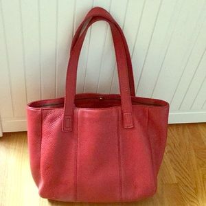 A red leather bag simple but beautiful